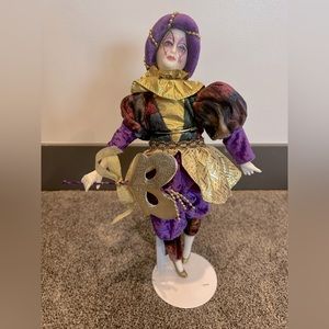 Porcelain clown doll